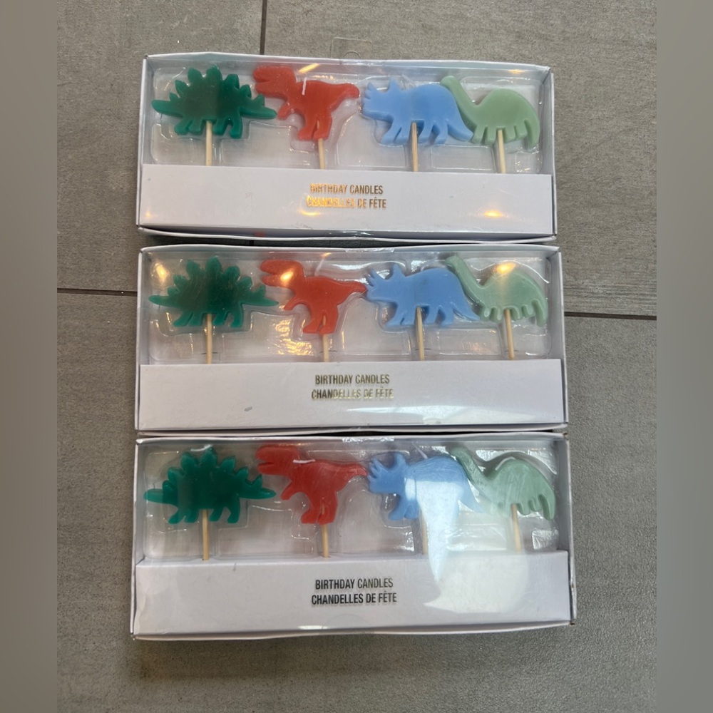 NWT Dinosaur Birthday Candles Set - each set has 4 candles approx 1”x2” each. 🦕